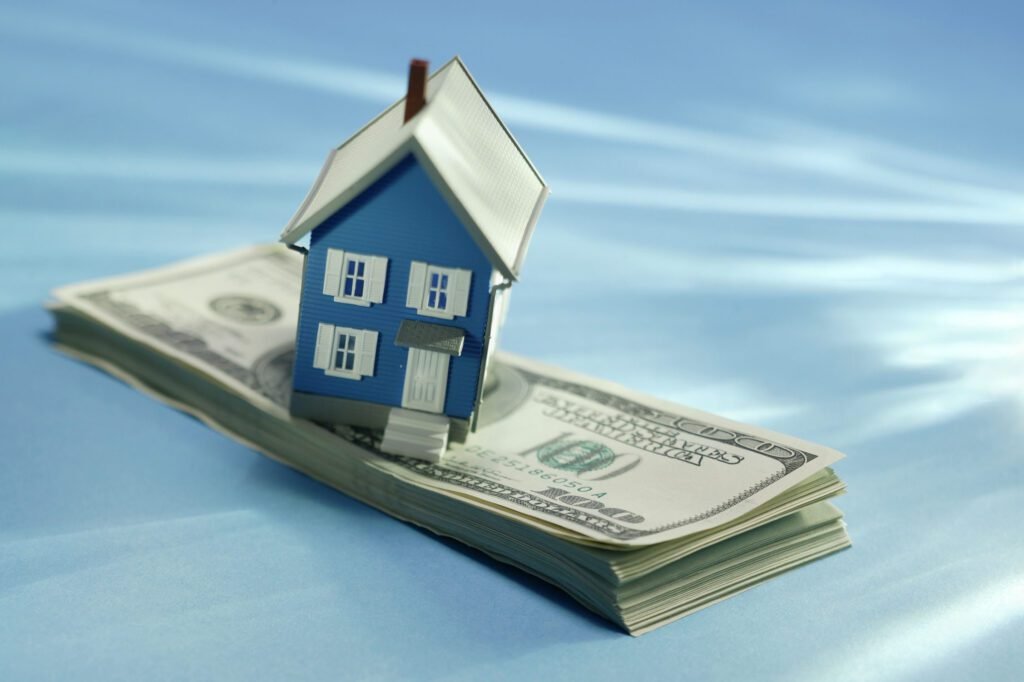 Mini house on top of money